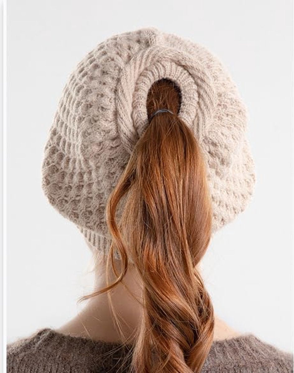 Women's winter hat - Knitted hat - Knitted hat with ponytail opening - Oversized cable-knit winter hat - Hat with skull motif